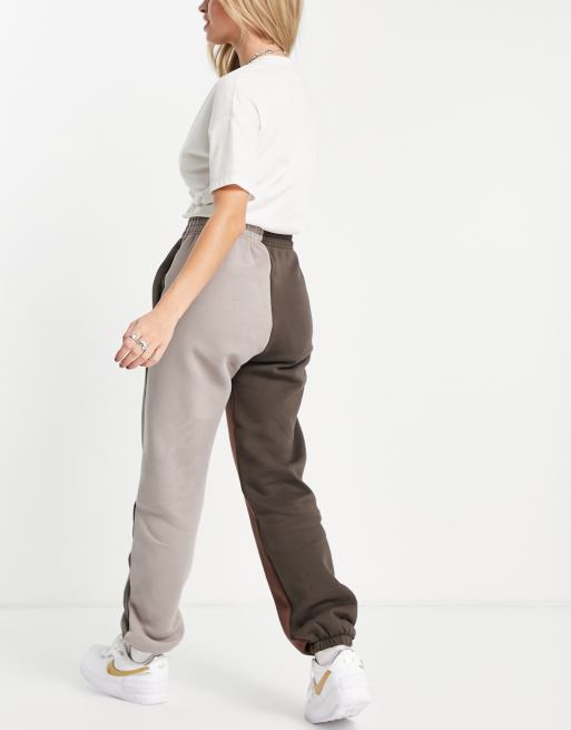 Nike Metallic Swoosh colour block joggers in brown and dark