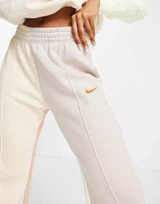 nike metallic swoosh colour block joggers