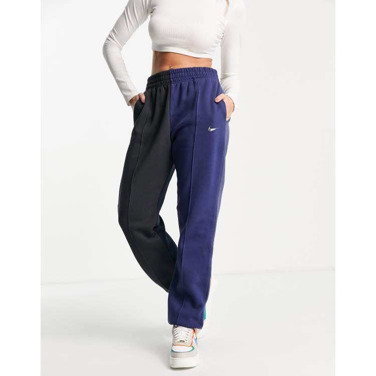 Nike Metallic Swoosh colour block joggers in navy mix