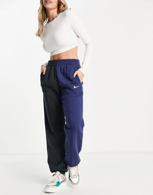 Nike Metallic Swoosh colour block joggers in navy mix ASOS