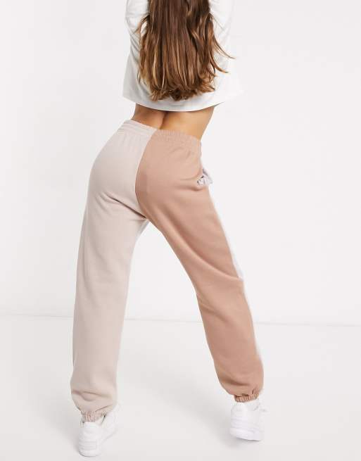 Nike Metallic Swoosh colour block joggers in neutrals ASOS