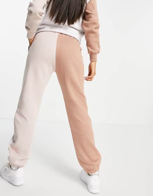 Nike Metallic Swoosh colour block joggers in neutrals