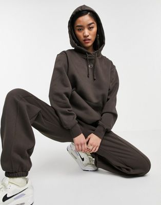 Nike metallic swoosh neutral hoodie in dark brown | ASOS