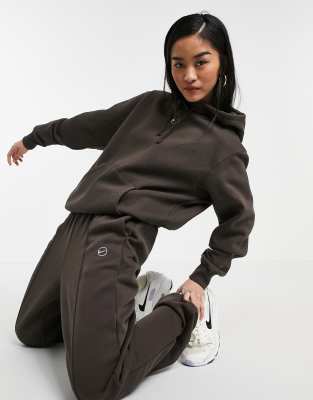 women's nike metallic swoosh tracksuit