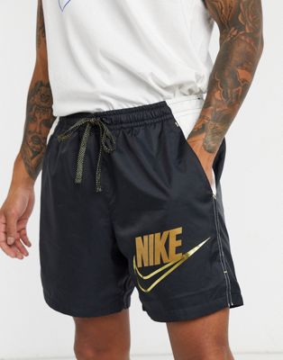 Nike metallic woven shorts with gold 