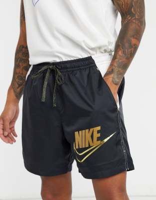 Nike metallic woven shorts with gold 