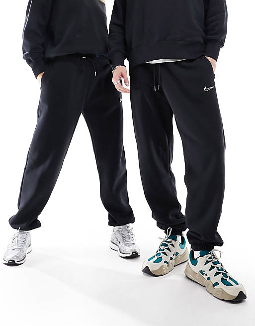 Nike - Midi - Pantalon unisexe à logo virgule - Noir