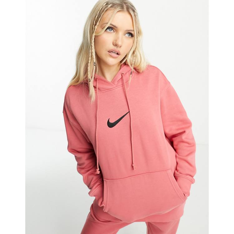 Nike mini swoosh oversized fleece joggers in fierce pink