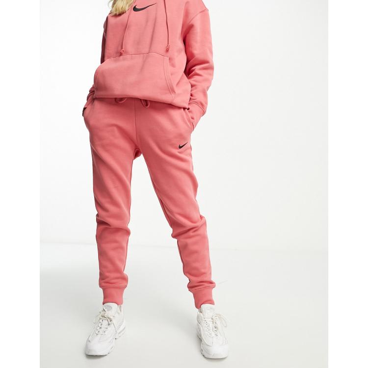 Pink nike best sale jogging suit mens