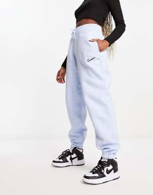Nike Midi Swoosh phoenix fleece joggers in celestine blue - ASOS Price Checker