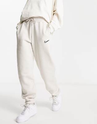 Swoosh joggers best sale