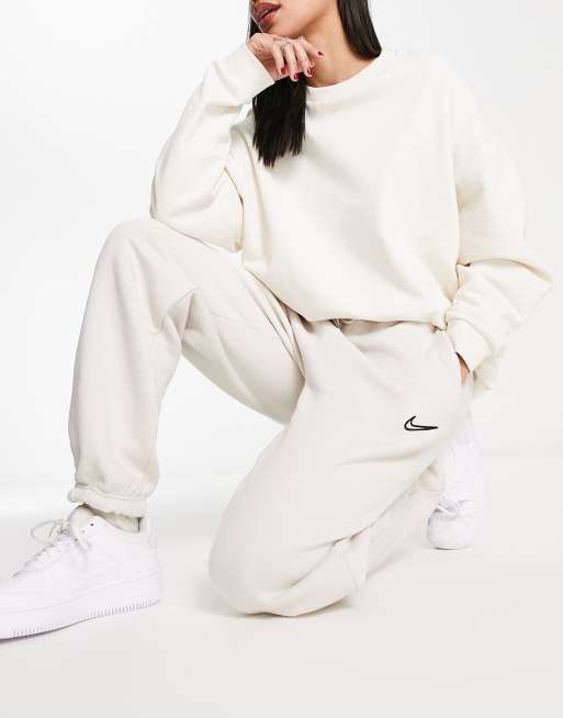 Nike Midi Swoosh phoenix fleece joggers in moon fossil, ASOS