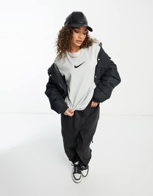 black and silver nike shirt