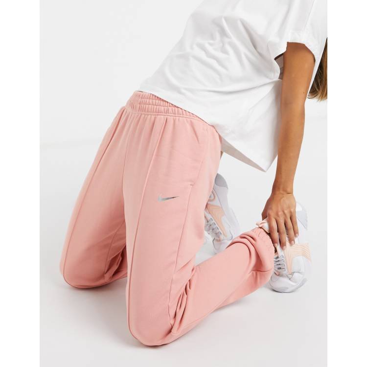 Nike mini metallic swoosh oversized joggers in coral