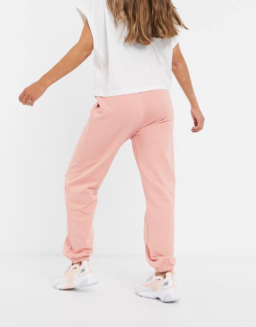 Nike mini metallic swoosh oversized joggers in coral