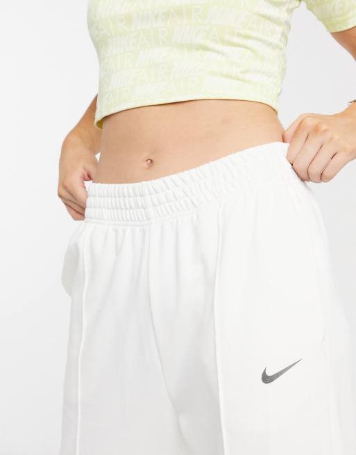 Nike mini swoosh oversized joggers in mineral clay, ASOS