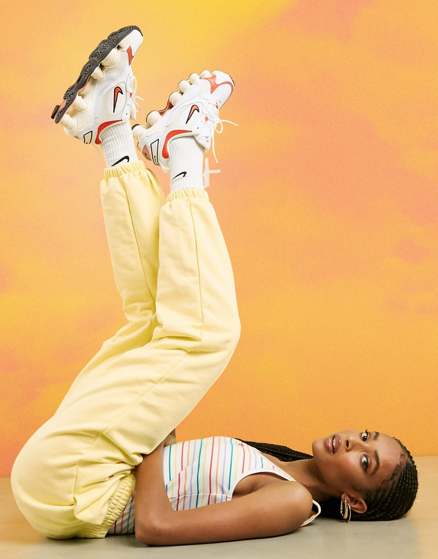 Nike mini metallic swoosh oversized joggers in yellow-Pink