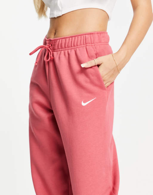 Nike mini swoosh oversized joggers in archaeo pink