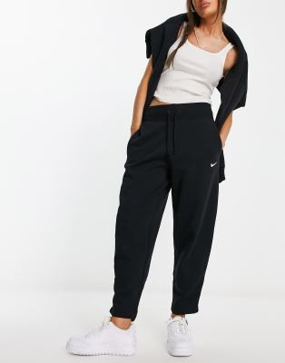 Nike mini swoosh high rise joggers in black | ASOS