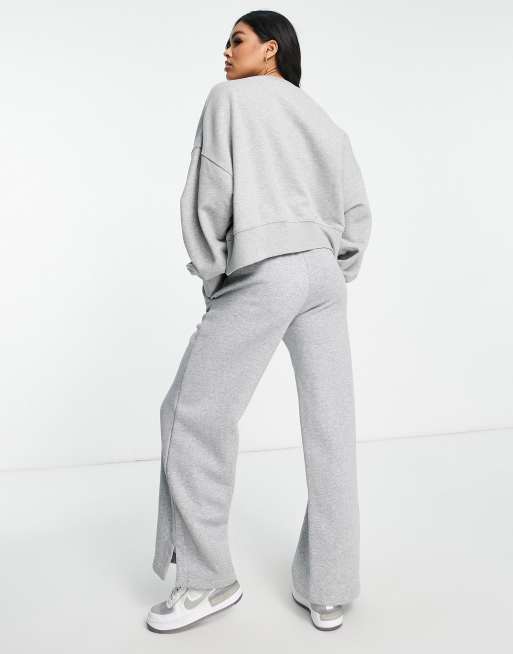 Nike mini swoosh high rise wide leg joggers in grey and sail