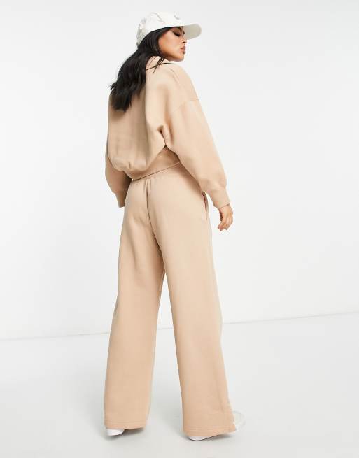 Nike Mini Swoosh wide leg joggers in taupe, ASOS