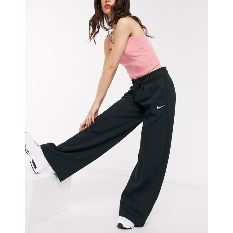 Nike mini swoosh high waisted wide leg joggers in black