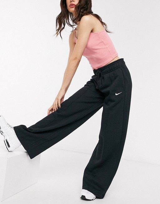 Nike mini swoosh high waisted wide leg sweatpants in black | ASOS