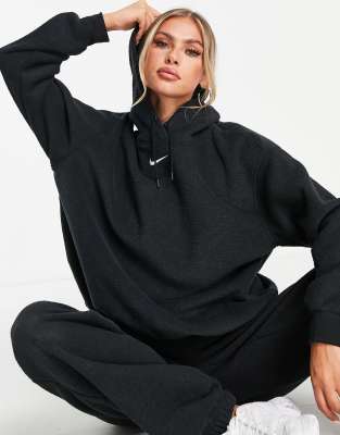 Nike mini swoosh longline pullover hoodie in black