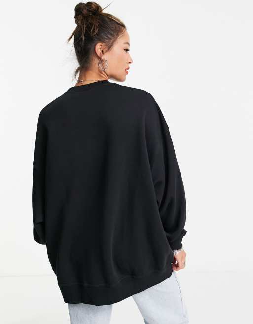 Nike mini swoosh longline sweatshirt in black