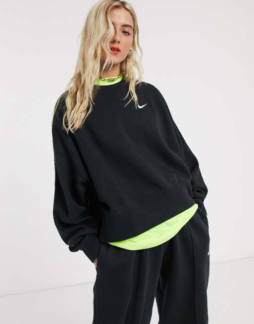 Nike mini Swoosh oversized boxy sweatshirt in black, ASOS