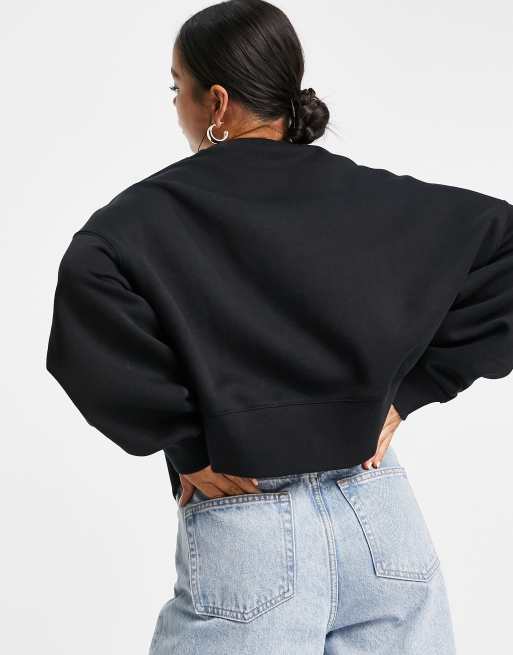 Nike mini Swoosh oversized boxy sweatshirt in black ASOS