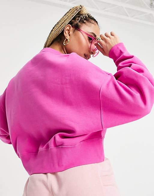 Nike mini Swoosh oversized boxy sweatshirt in fuchsia pink