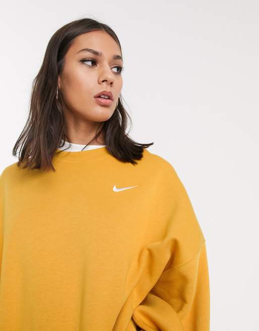 Nike mini swoosh oversized boxy sweatshirt in yellow