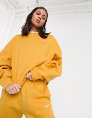 nike dark yellow mini swoosh oversized sweatshirt