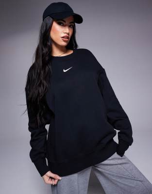 Nike mini swoosh quarter zip sweatshirt in black and sail