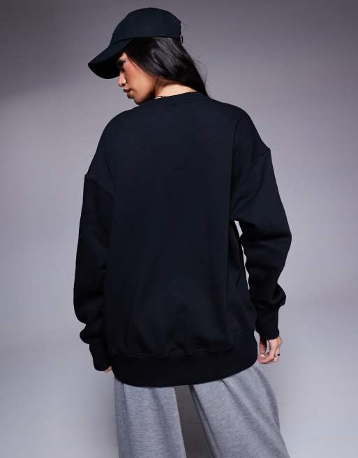 Nike mini swoosh oversized crew sweatshirt in black and sail ASOS