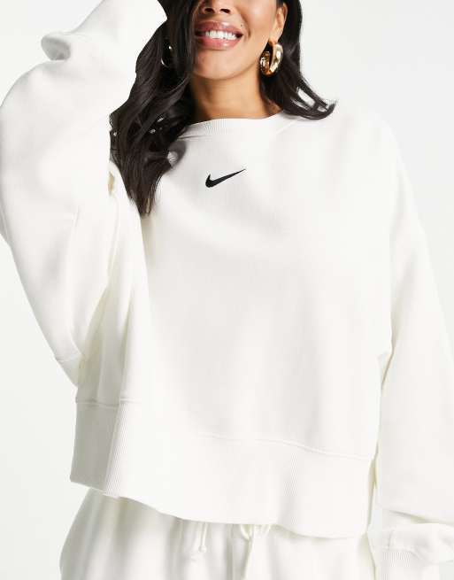 Nike cream mini swoosh best sale oversized sweatshir