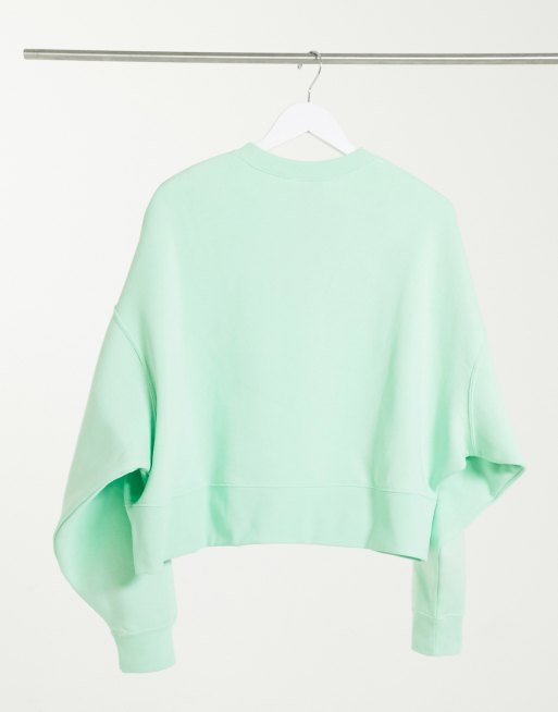 Nike mini swoosh oversized cropped sweatshirt in green ASOS