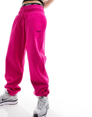 Nike mini swoosh oversized fleece joggers in fierce pink 47.00