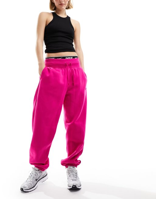 Nike mini swoosh oversized joggers in archaeo pink