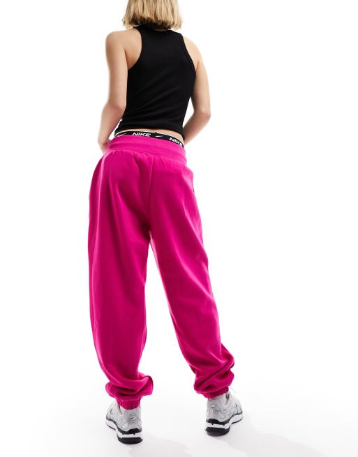 Nike mini swoosh oversized fleece joggers in fierce pink