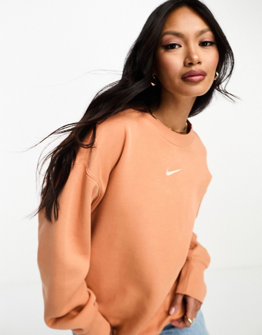 Nike mini swoosh oversized fleece sweatshirt in amber brown