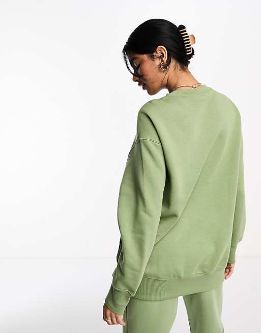 Nike mini swoosh oversized fleece sweatshirt in oil green | ASOS Nike mini swoosh oversized fleece sweatshirt in oil green | ASOS