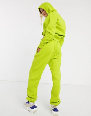 nike mini swoosh oversized sweatpants in green