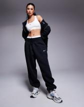 Nike Unisex retro athletics fleece joggers in grey heather and navy