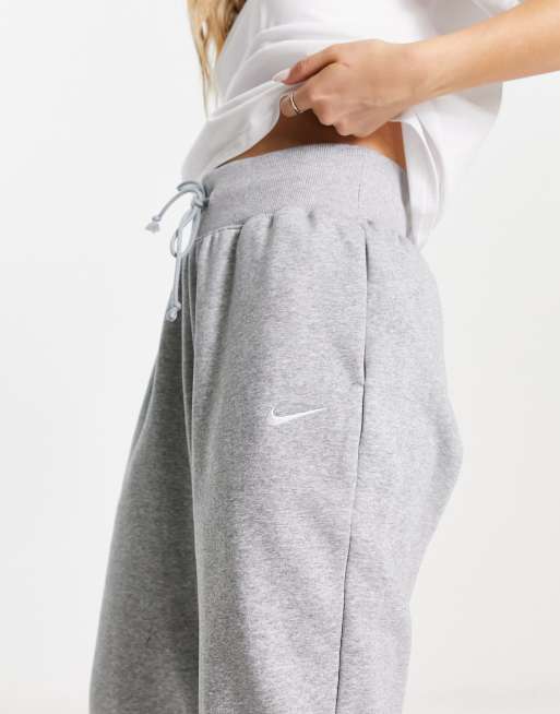 Nike mini swoosh high waisted wide leg joggers in grey, ASOS