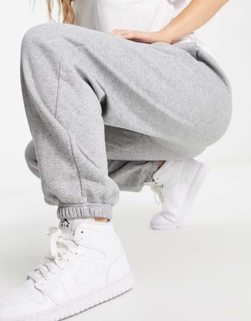 Nike mini swoosh oversized high rise joggers in grey and sail