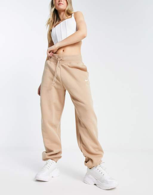 Nike mini swoosh high waisted wide leg joggers in grey, ASOS