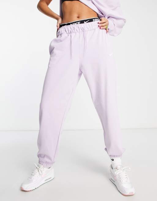 Nike swoosh joggers purple new arrivals