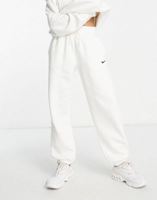Nike mini swoosh oversized high rise joggers in sail white | ASOS
